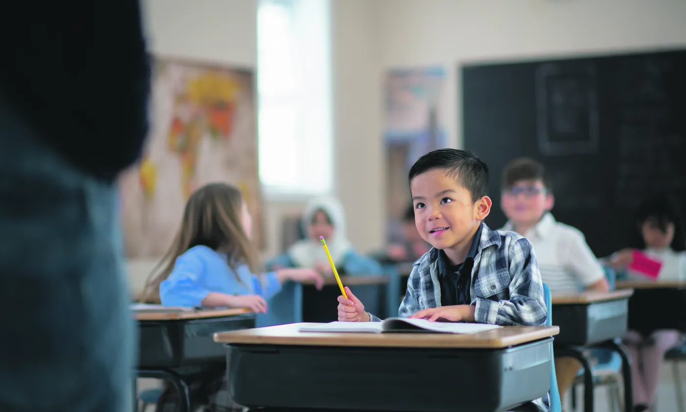 Elève attentif en classe © iStock